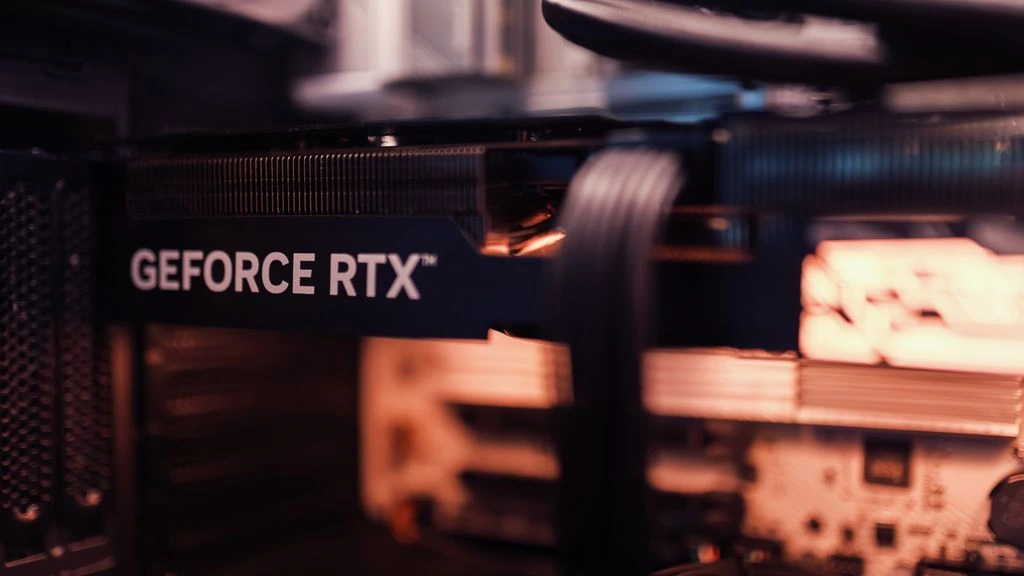 RTX 5090 Founders Edition card on a neutral studio background